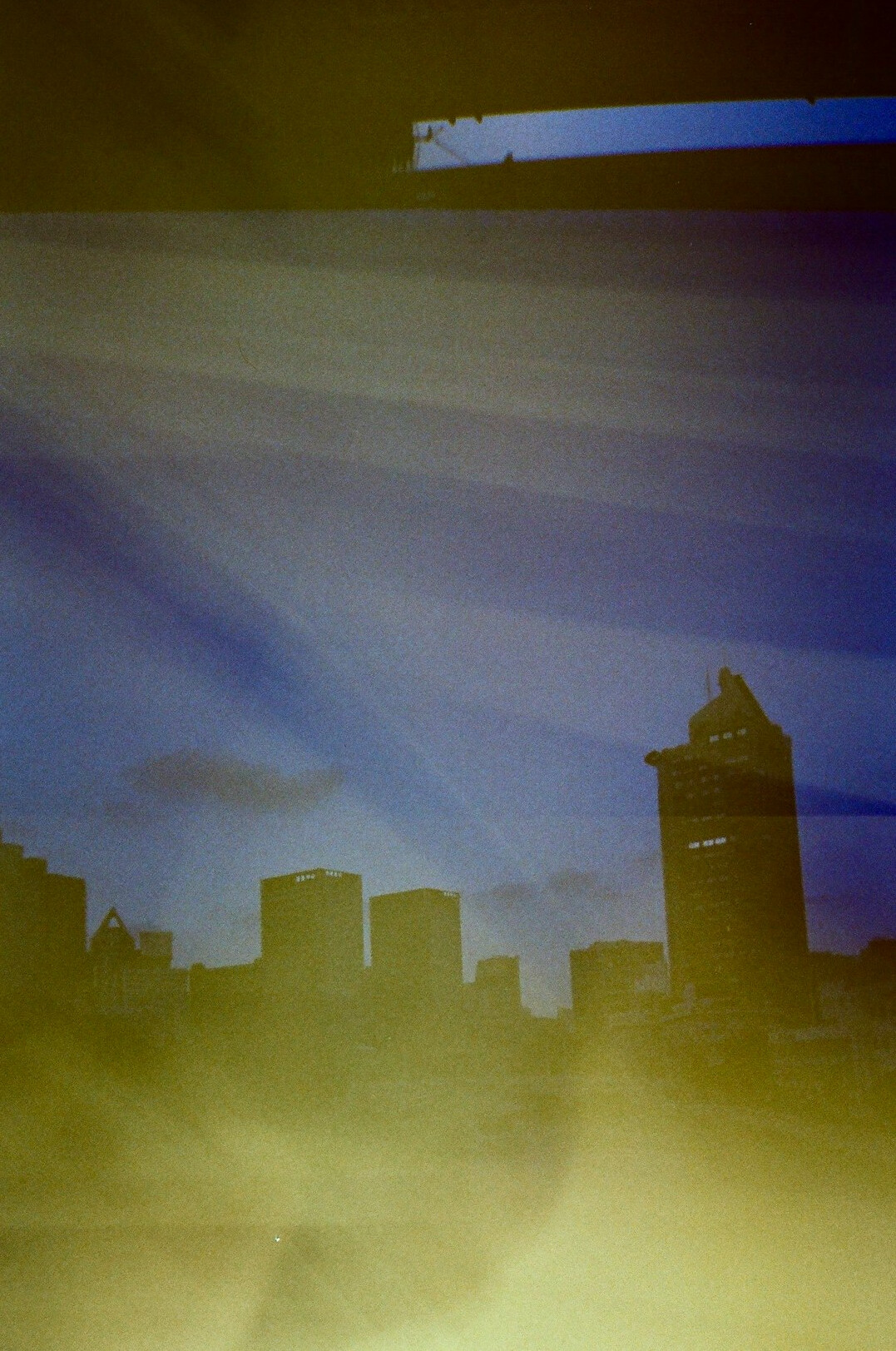 ufo hovering over city skyline