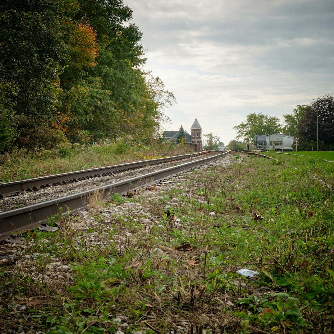 Abandoned railway station platform in the countryside